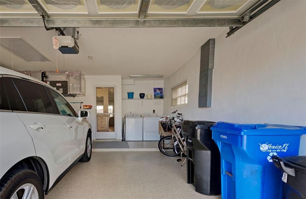 2 car attached garage with epoxy floors is just the right size for your cars and toys.