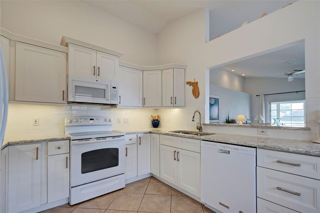 Roomy kitchen has plenty of counter space, making meal prep a snap.