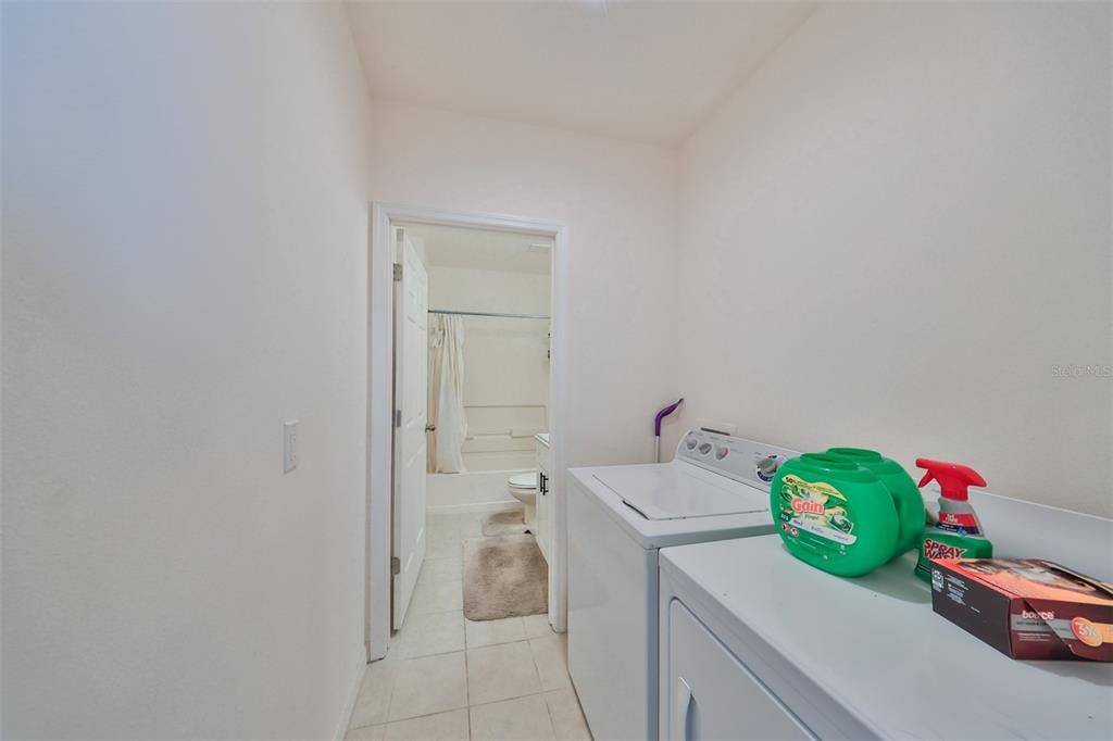 Laundry Room - leading to guest bathroom