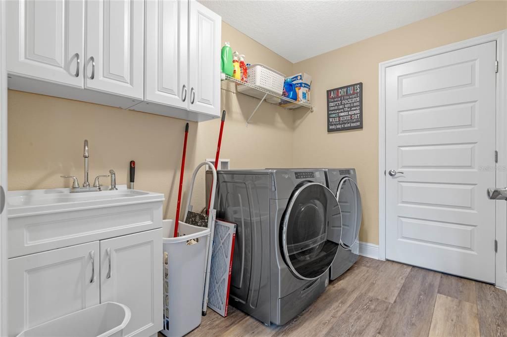 Large Laundry with Cabinets & TUb!  Washer and Dryer Included.