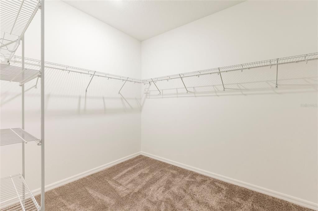 Huge Primary Walk In Closet