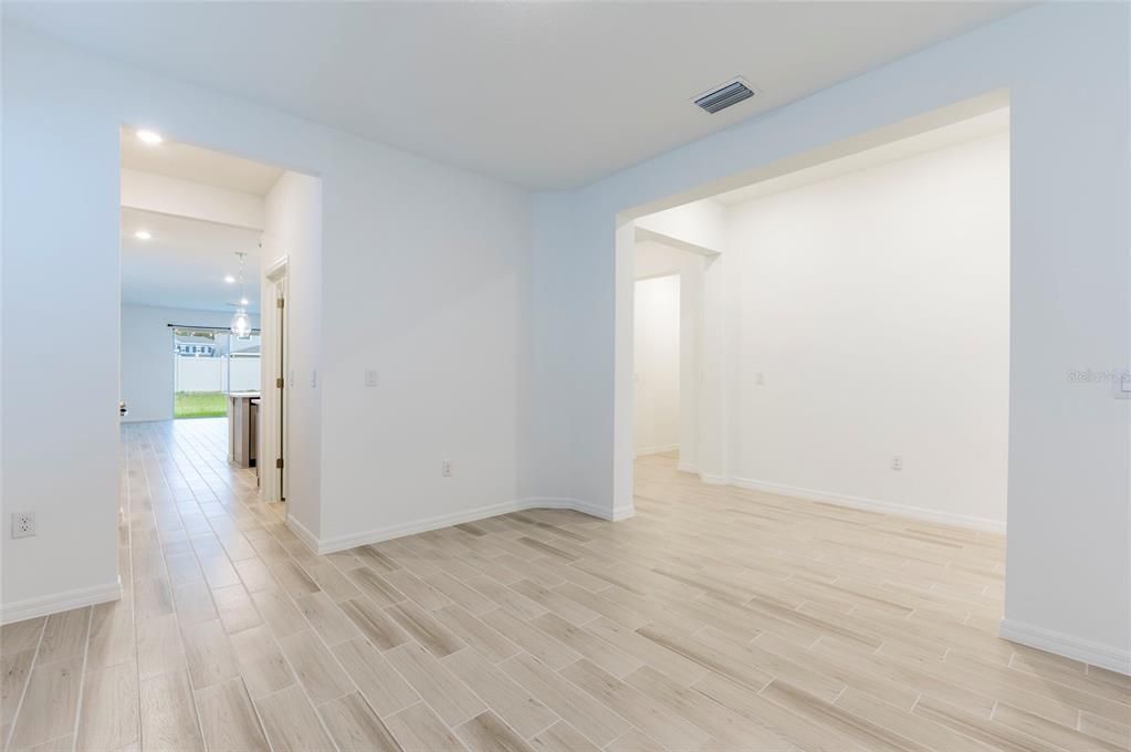 Formal Dining Room, Dry Bar and Foyer