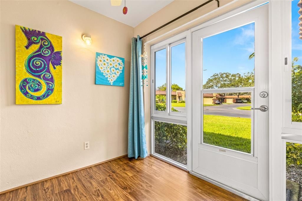 New plexiglass windows and door leading to the pool, Clubhouse and picnic area for grilling.