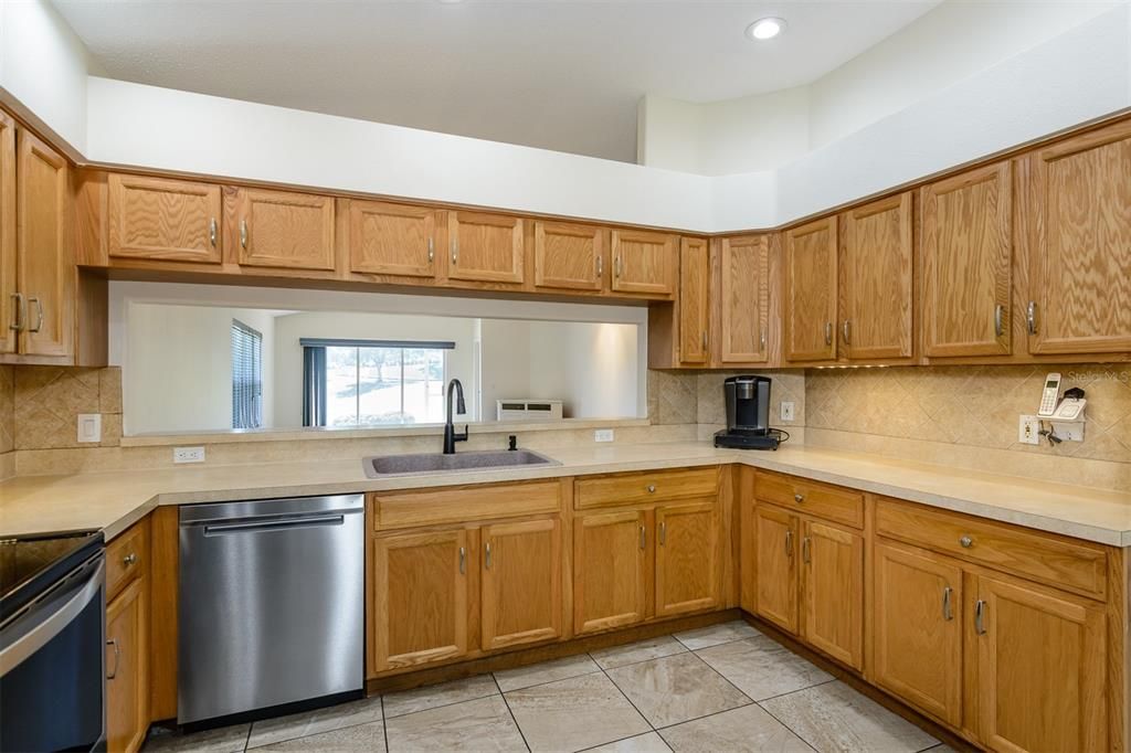 KITCHEN WITH PASS THROUGH TO DINING AREA