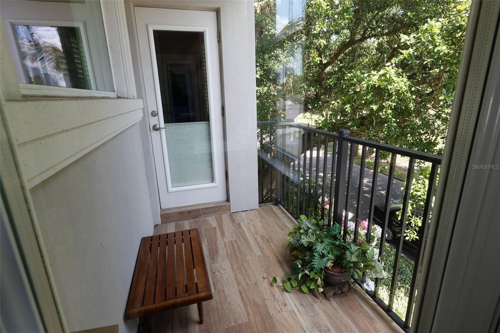 BALCONY ABOVE THE FRONT ENTRANCE WITH ENTRY FROM THE LOFT AND FROM THE 2ND BEDROOM