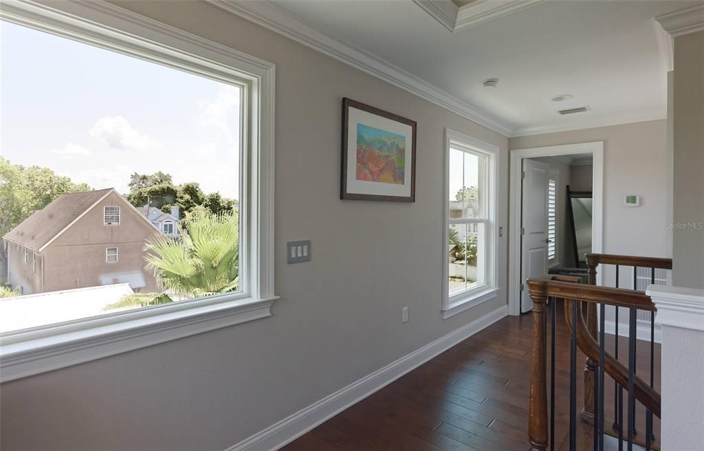 3RD FLOOR HALL WAY FROM THE PARTY/ROOF PATIO AREA TO THE PRIMARY BEDROOM