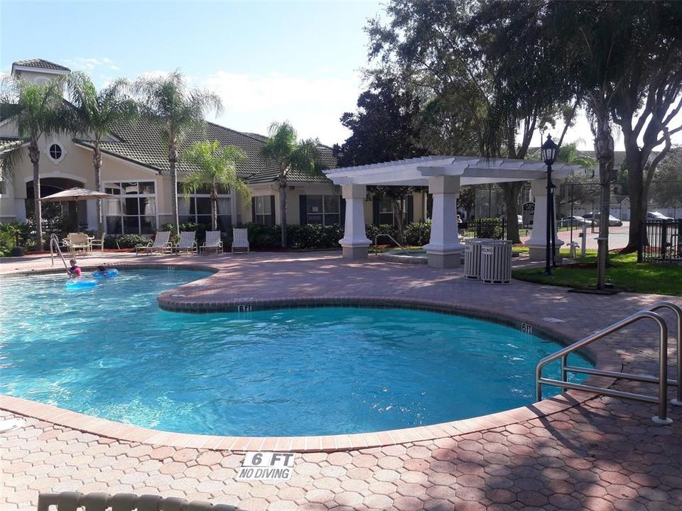 resort style pool with pavillon