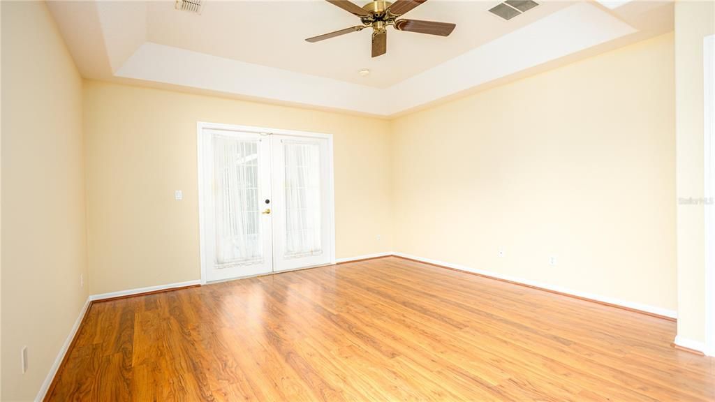 Master bedroom/ tray cieling /bathroom at the end with his and her closets