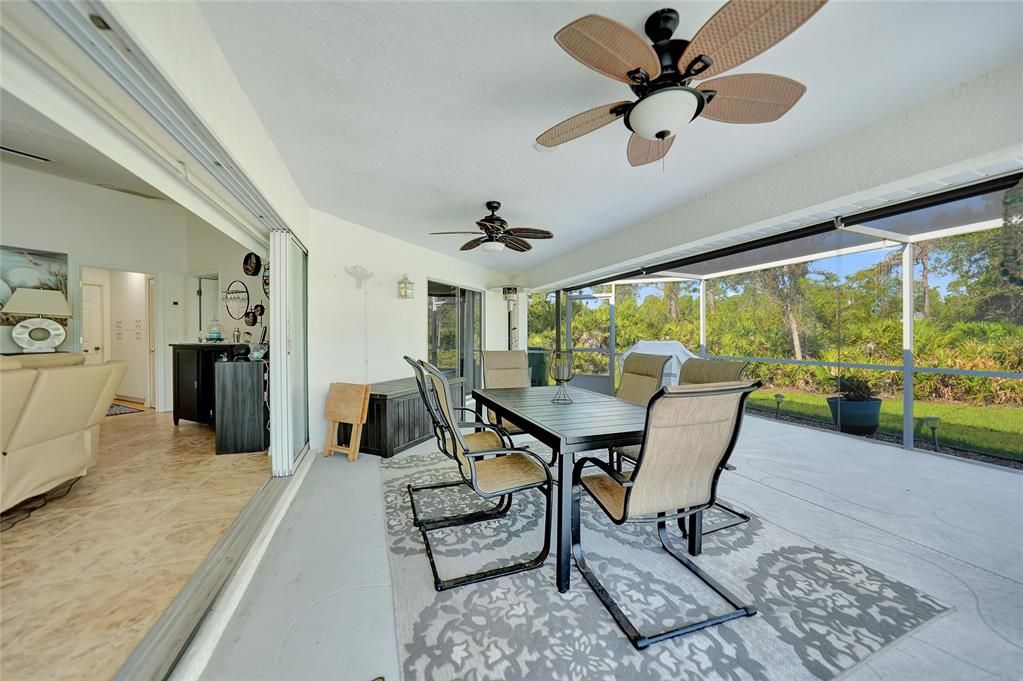 lanai seating area under roof and screened in