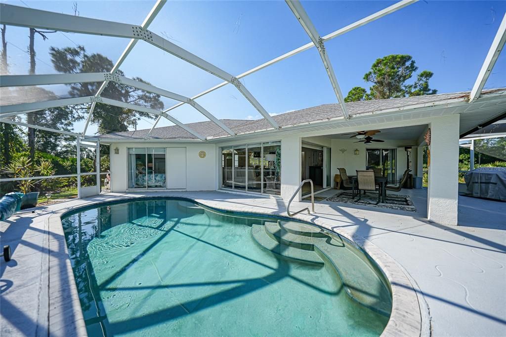 home has sunning area and covered area to enjoy year round