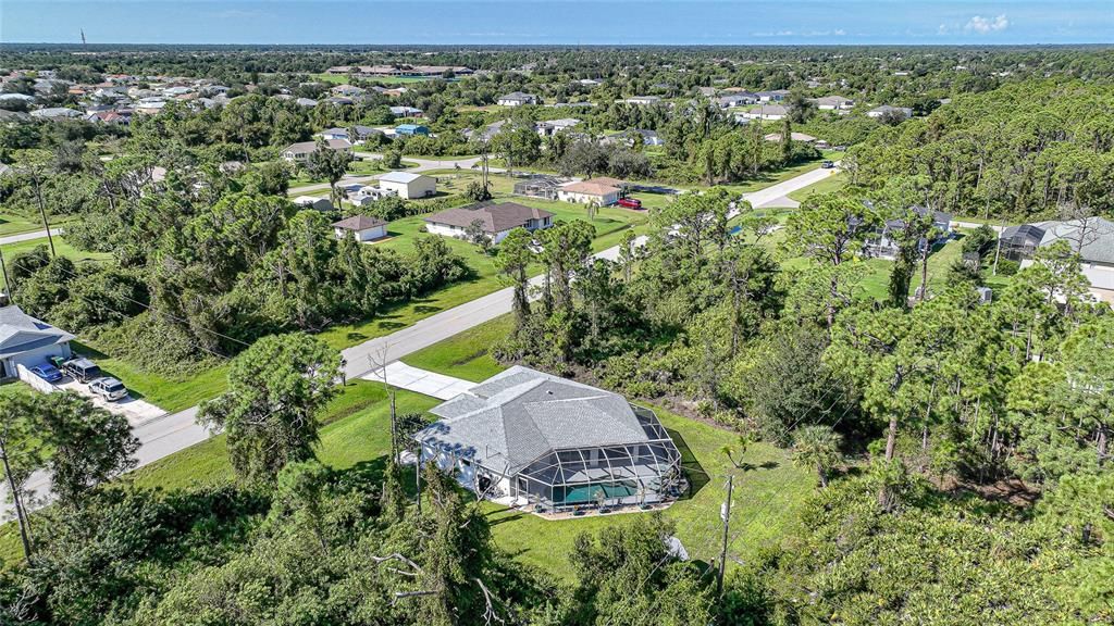 drone view of home from backyard