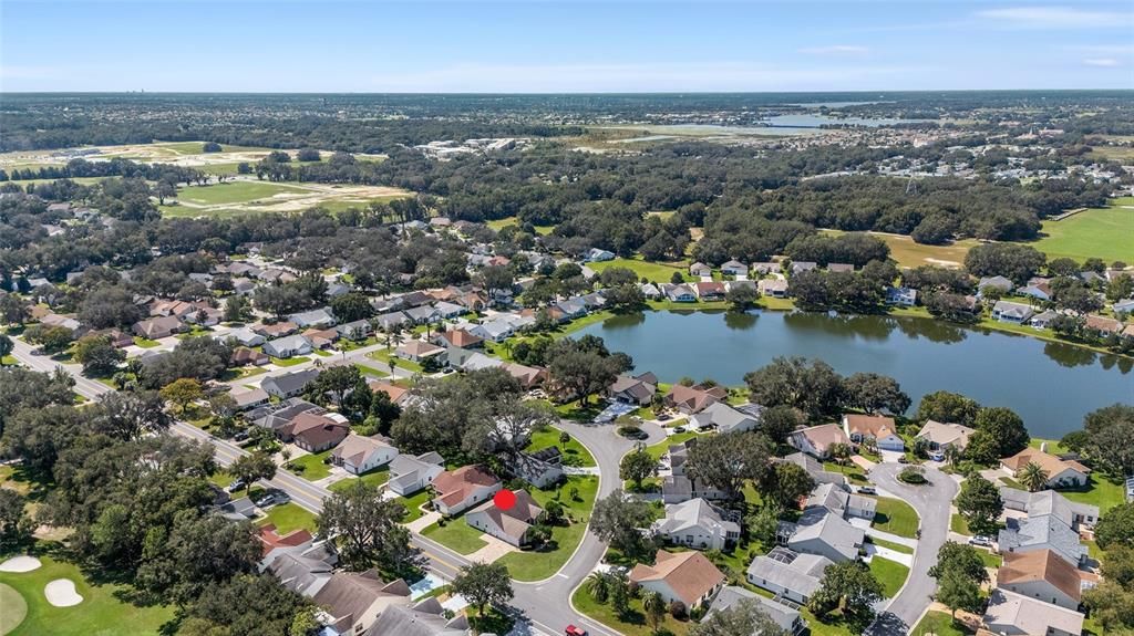 AERIAL looking Southwest - Lake Sumter Landing (deep right), CR 466 (deep left to deep right)