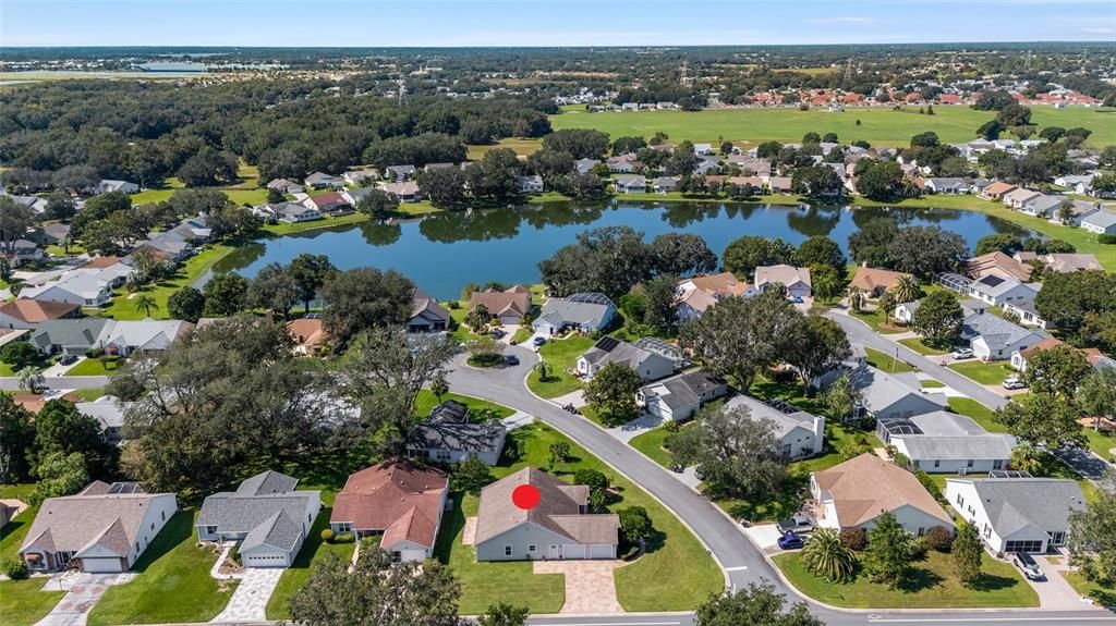 AERIAL looking West - Gonzales Place (front center), Morse Bridge leading to Lake Sumter Landing (deep left)