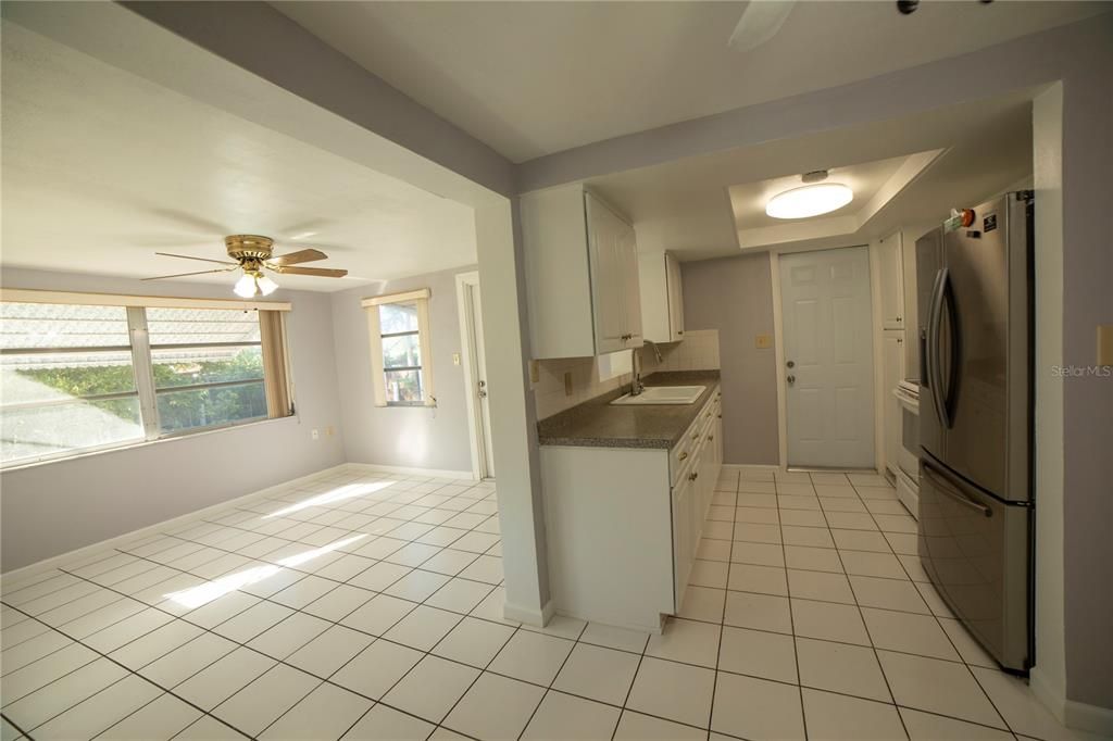 From the dining area looking into the family room and kitchen...