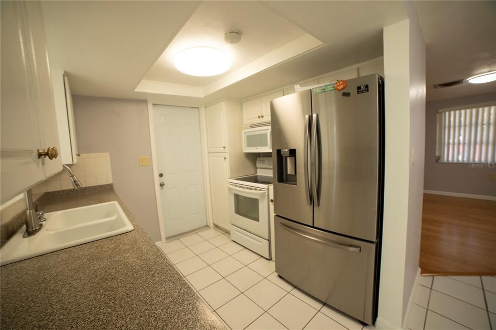 Led ceiling lamp and smoke detector in kitchen