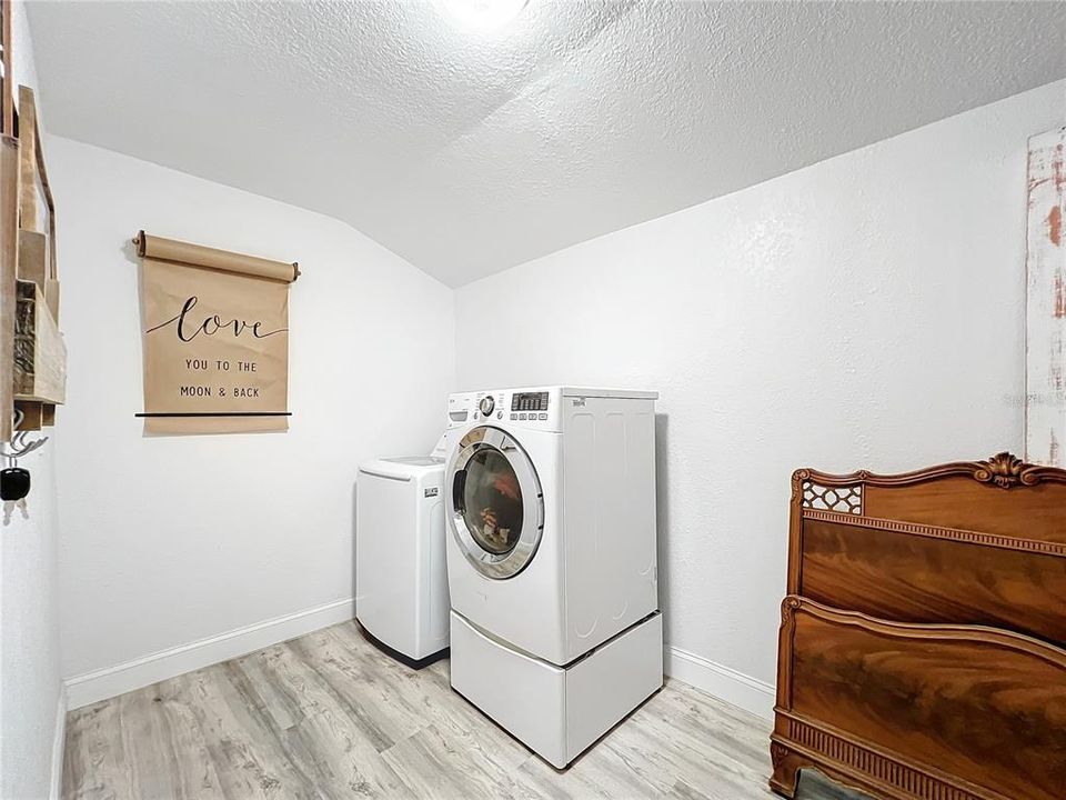 Inside laundry room off of dining room