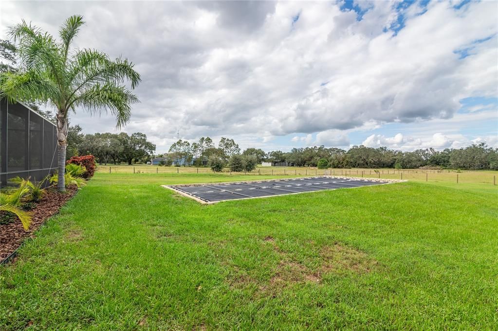 Rear View Ground Pool Solar Panels 3