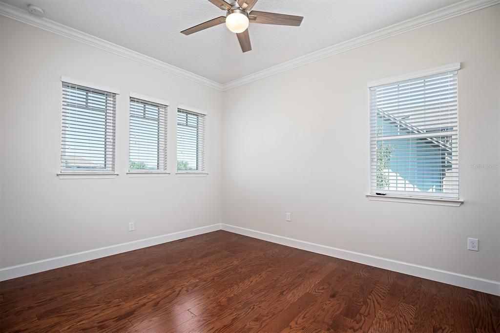 Bedroom 2 with engineered hardwood floors