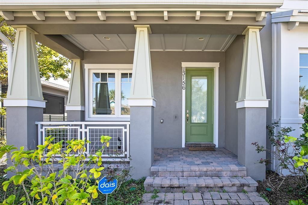 Brick paver entry way & covered front porch