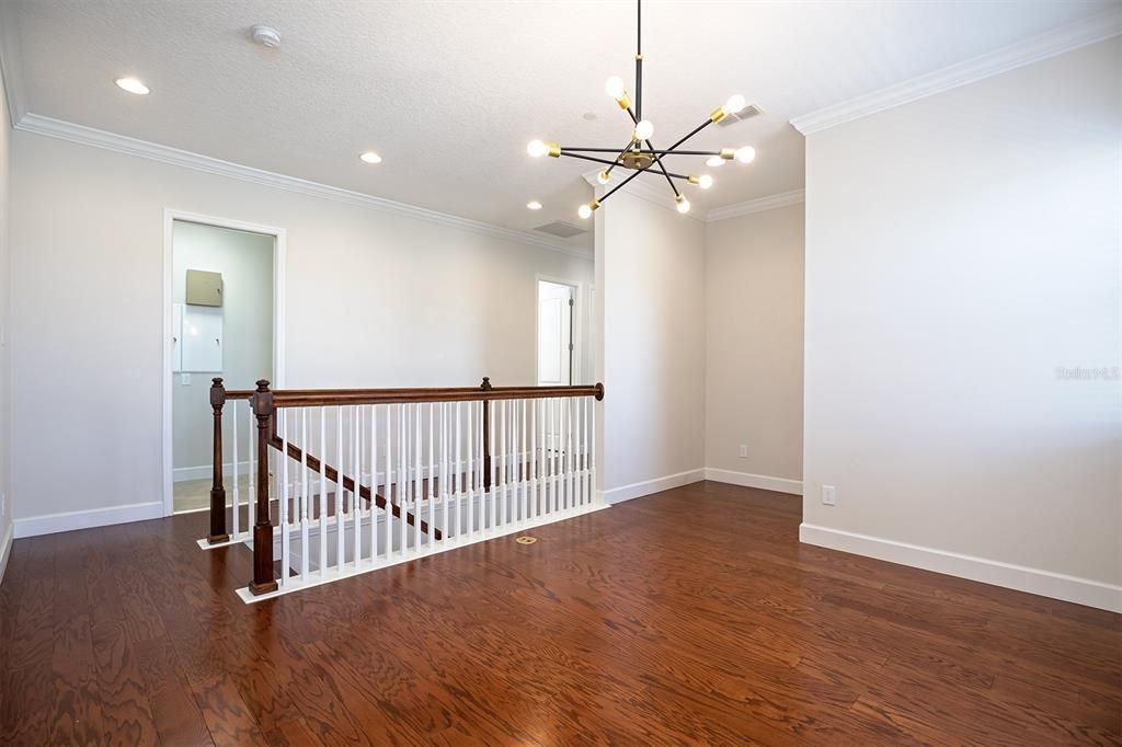 Upstairs loft with engineered wood floors