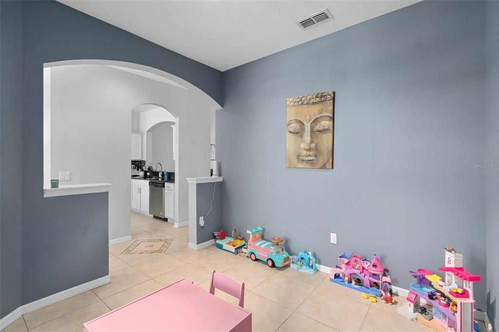 Flexible Dining Room Space Currently Used as a Playroom