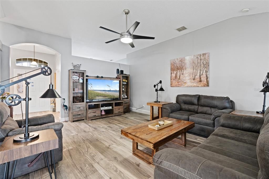 living room with views of the lake behind