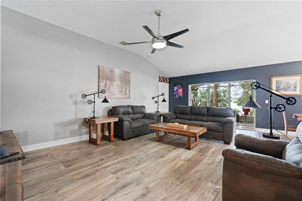 living room with views of the lake behind