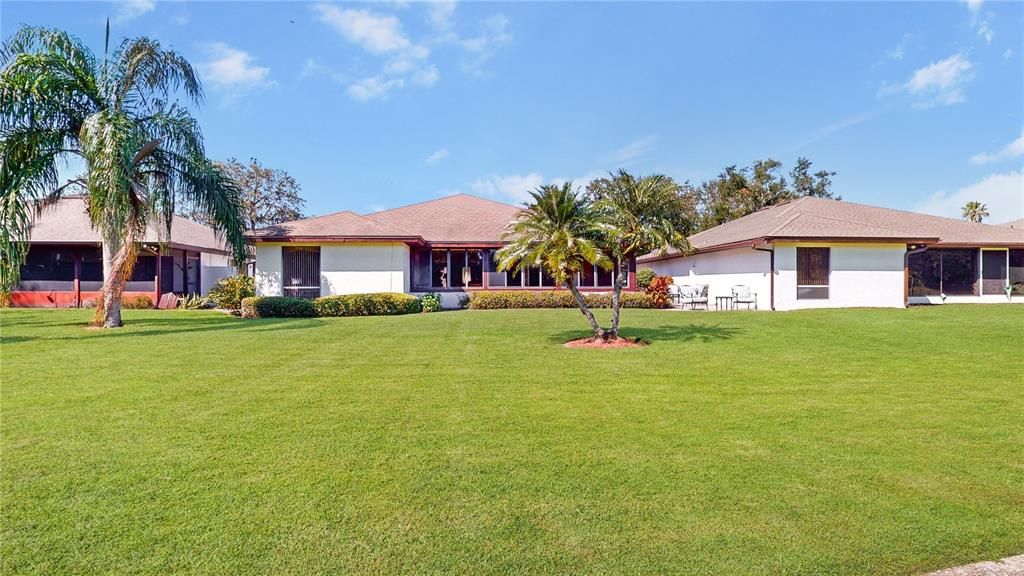 The impeccably gorgeous back view of this home