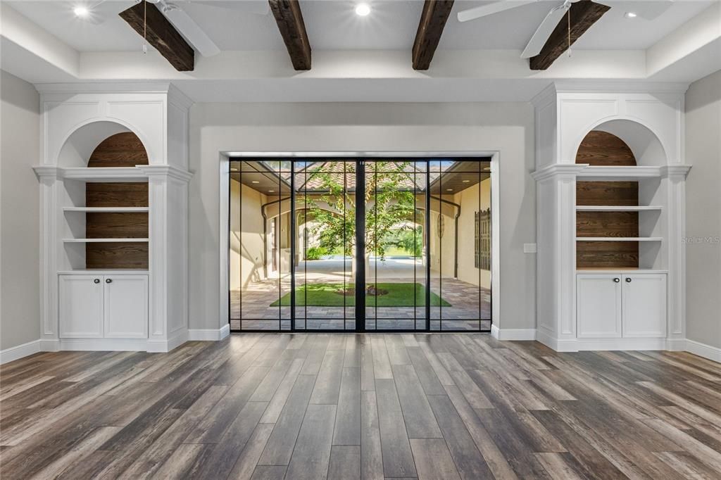 Double doors out to Screened courtyard