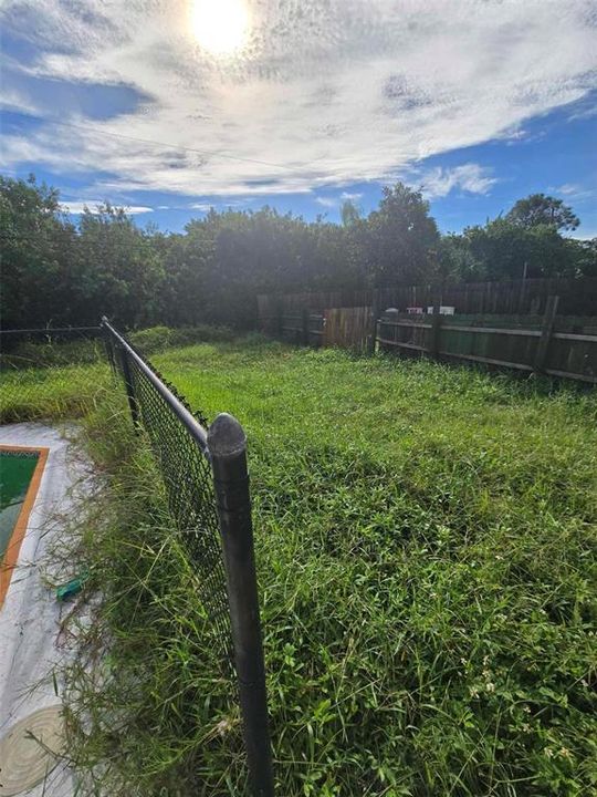 Fenced in Yard with view of secondary fenced in area to right of property