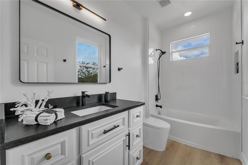 The 5th Bedroom has a Spacious Custom Built Walk-in-Shower