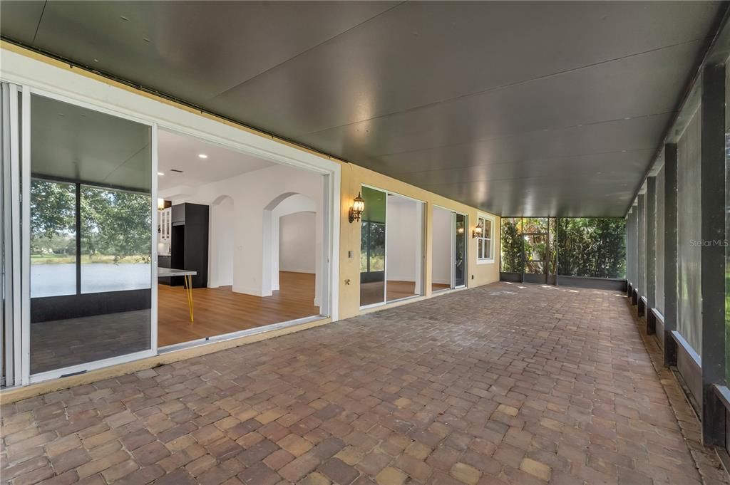 The Screened in Patio runs the Entire Length of the Back of the Home