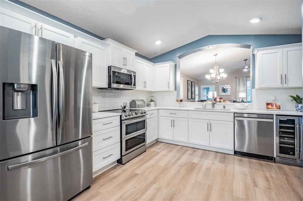 Nice touch of color with plenty of counter and cabinet space