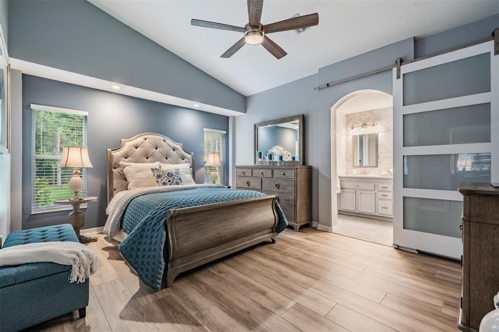 A beautifully appointed master bedroom with designer touches