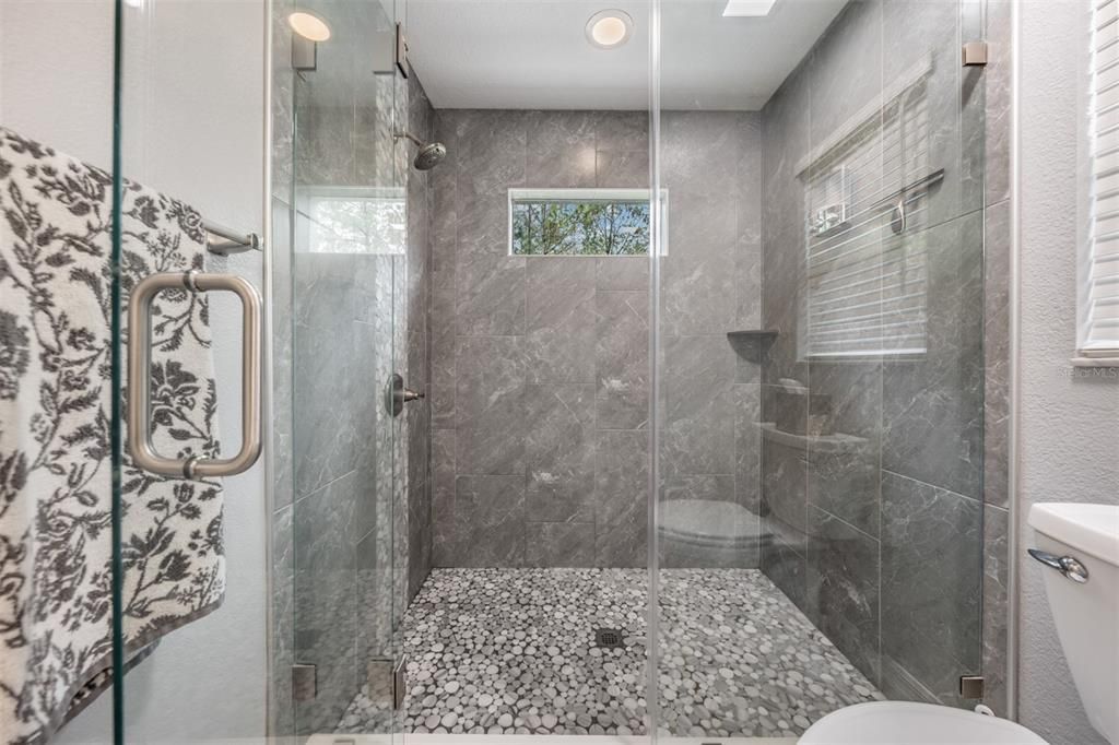 Oversized glass, step in shower