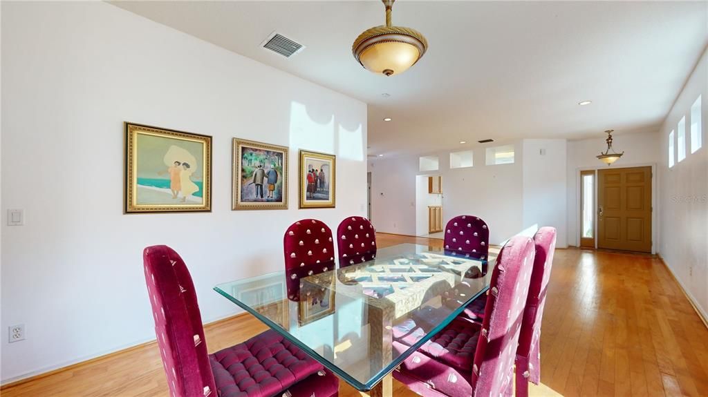 FORMAL DINING ROOM WITH FOYER VIEWS