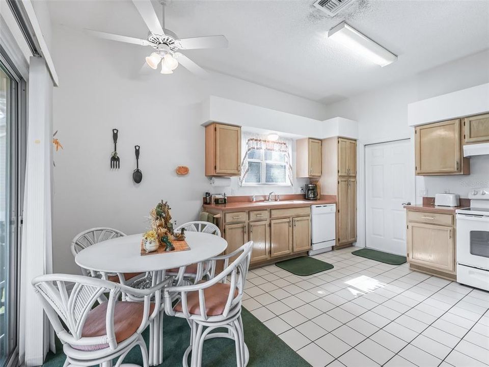 Eat In Kitchen with Sliding Door to Rear Screened Lanai