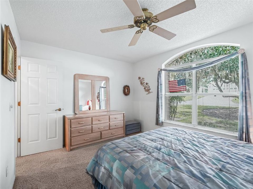 Large Window Overlooking the Front Yard of the Home