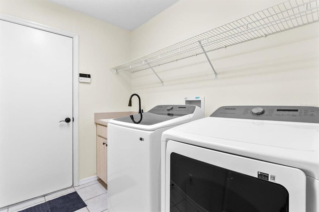 Laundry Room w/ Door to Garage... NEW Washer & Dryer