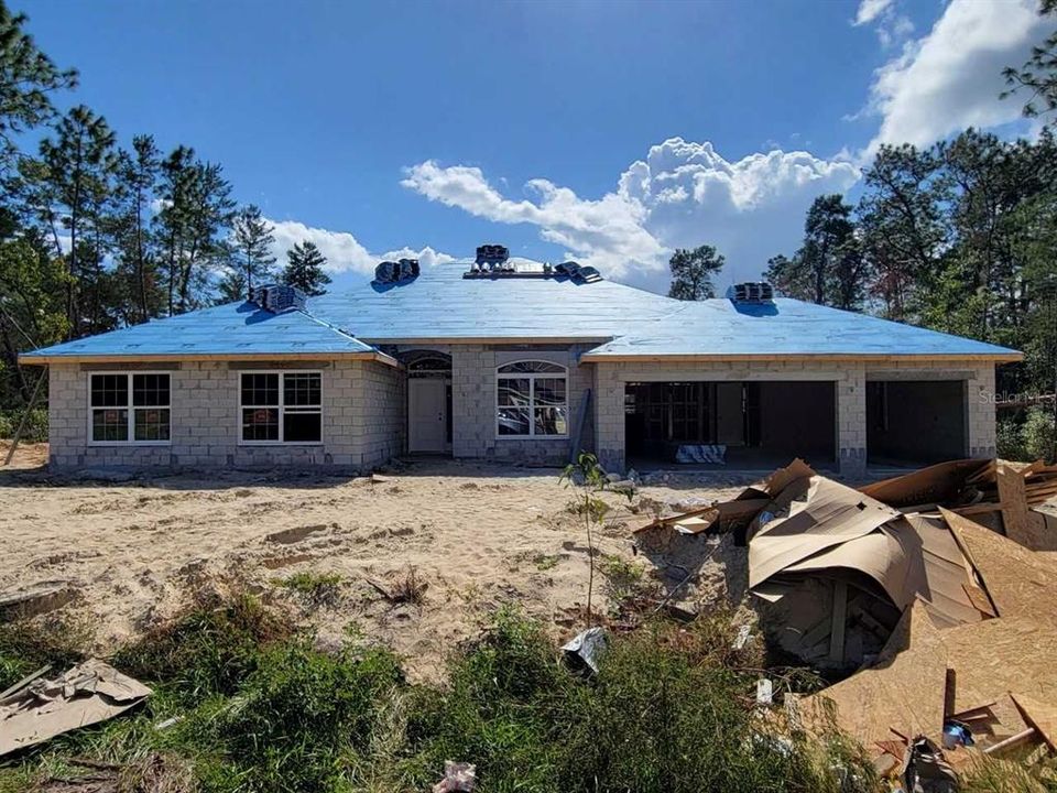 Actual home under construction,  3 car garage!