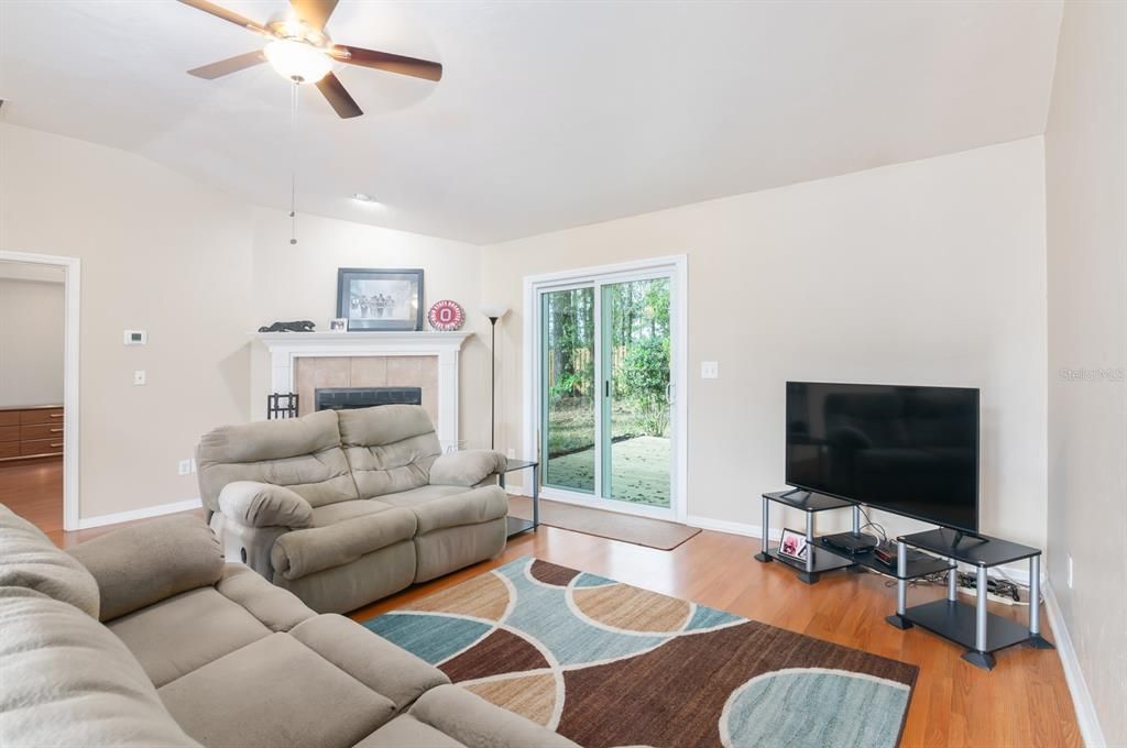 Living room with new sliding doors to deck