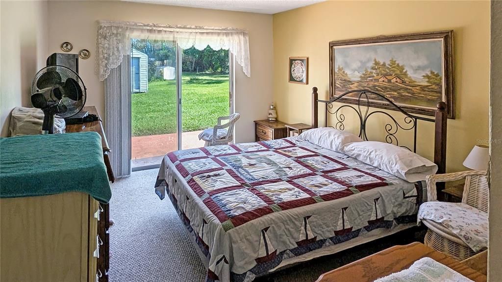 Master Bedroom Overlooking Backyard!