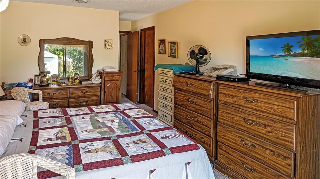 Master Bedroom as seen from Sliding Doors leading to backyard, looking towards Entrance and Master Bath!