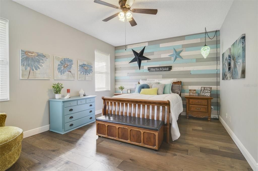 The SPLIT BEDROOM layout delivers a tranquil retreat for the new owner complete with another fabulous accent wall, WALK-IN CLOSET and well appointed en-suite bath.