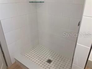 Unit B tiled shower