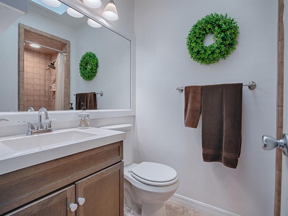 Ensuite bath with stylish vanity ~