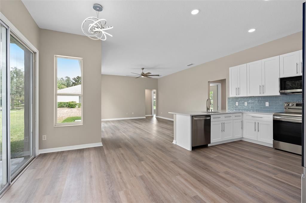 VIEW FROM THE DINETTE INTO THE KITCHEN AND GREAT ROOM