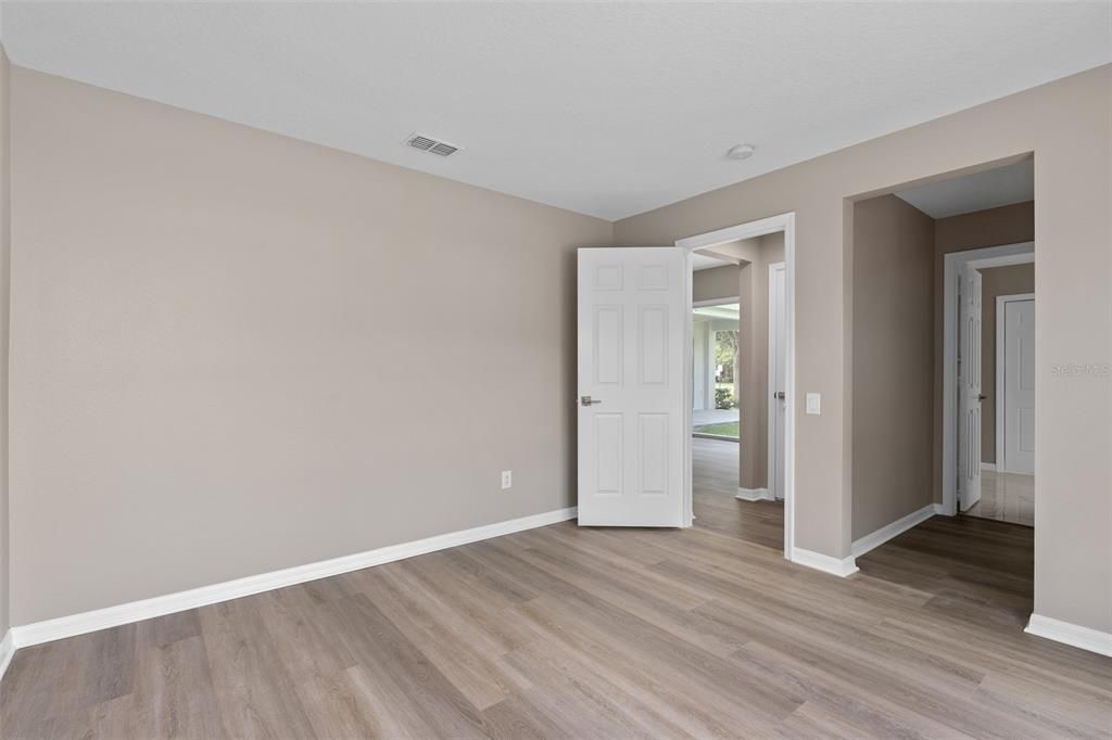 BEDROOM 4 HAS ITS OWN ATTACHED FULL BATHROOM WITH SHOWER STALL. VERY EASILY COULD BE USED AS AN IN LAW SUITE AS IT HAS A SEPARATE DOOR TO THE OUTSIDE THROUGH THE BATHROOM. THEIR IS A HUGE STORAGE CLOSET RIGHT OUTSIDE THE BEDROOM DOOR.