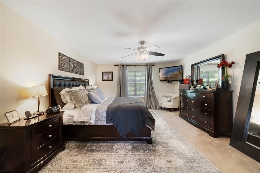 The spacious second floor PRIMARY SUITE has a WALK-IN CLOSET and private en-suite bath featuring DUAL SINKS, a SOAKING TUB, and a separate glass enclosed shower.