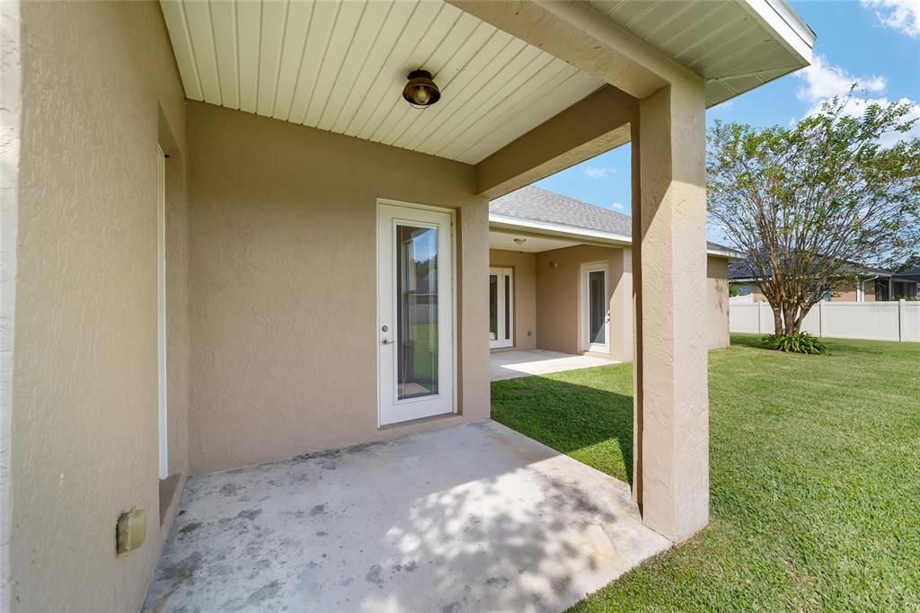 This patio leads into an indoor bathroom which will be great for a future pool bath.